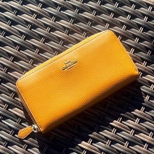 COACH zippered leather tan wallet!